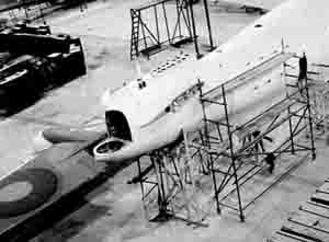 Tail section being fitted in the Windermere hangar. Note the wing recently arrived from Rochester nearby
